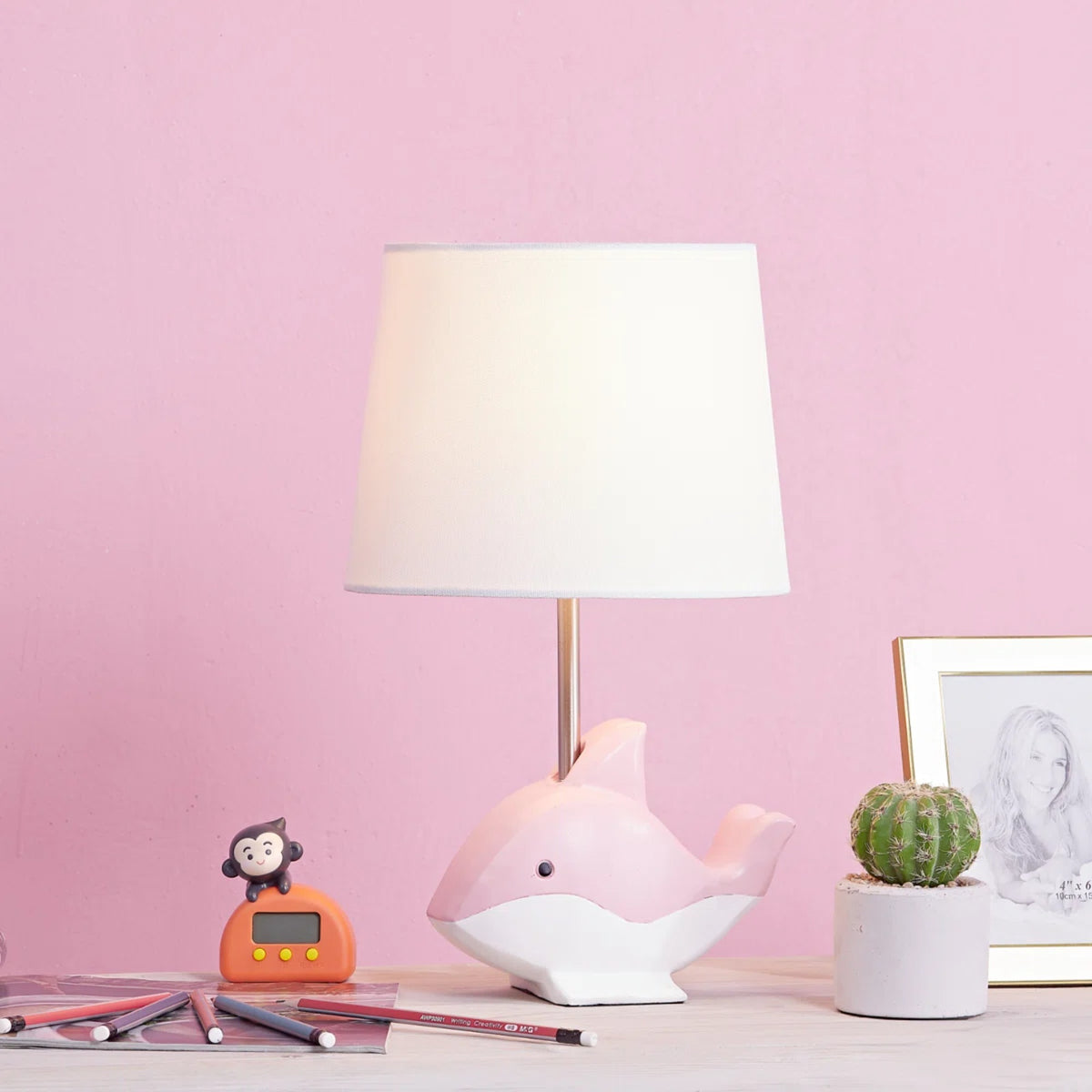 15-Inch Dolphin Table Lamp, Pink Resin Base with White Linen Shade