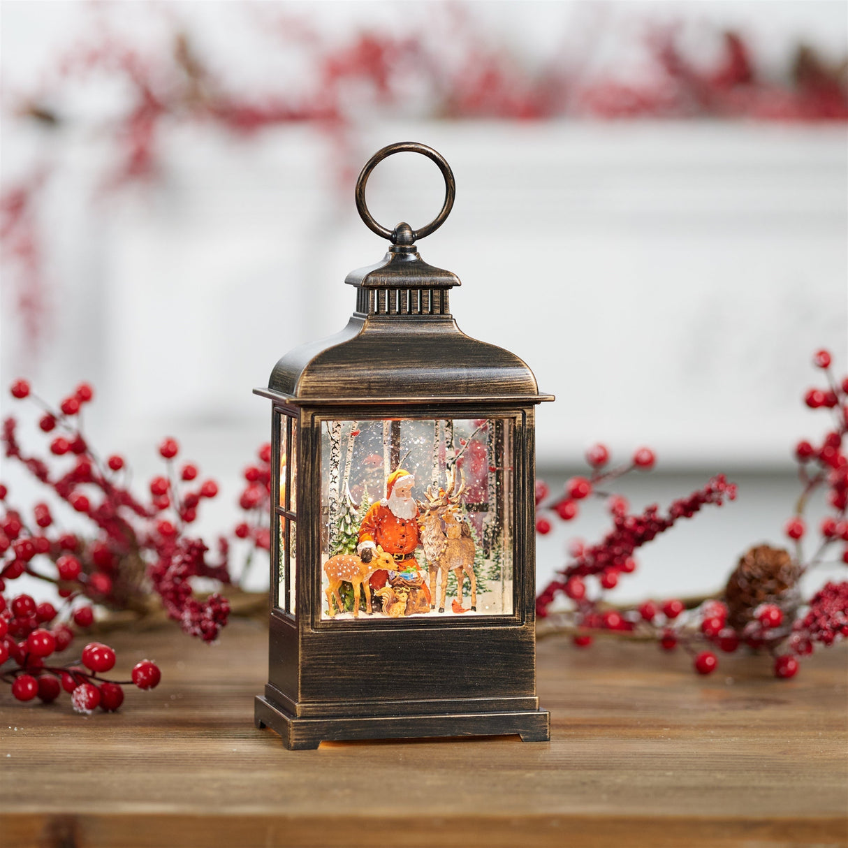 Led santa and woodland animals snow globe 9"h
