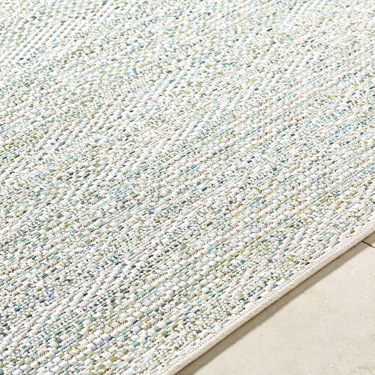 Alezae Ivory Area Rug