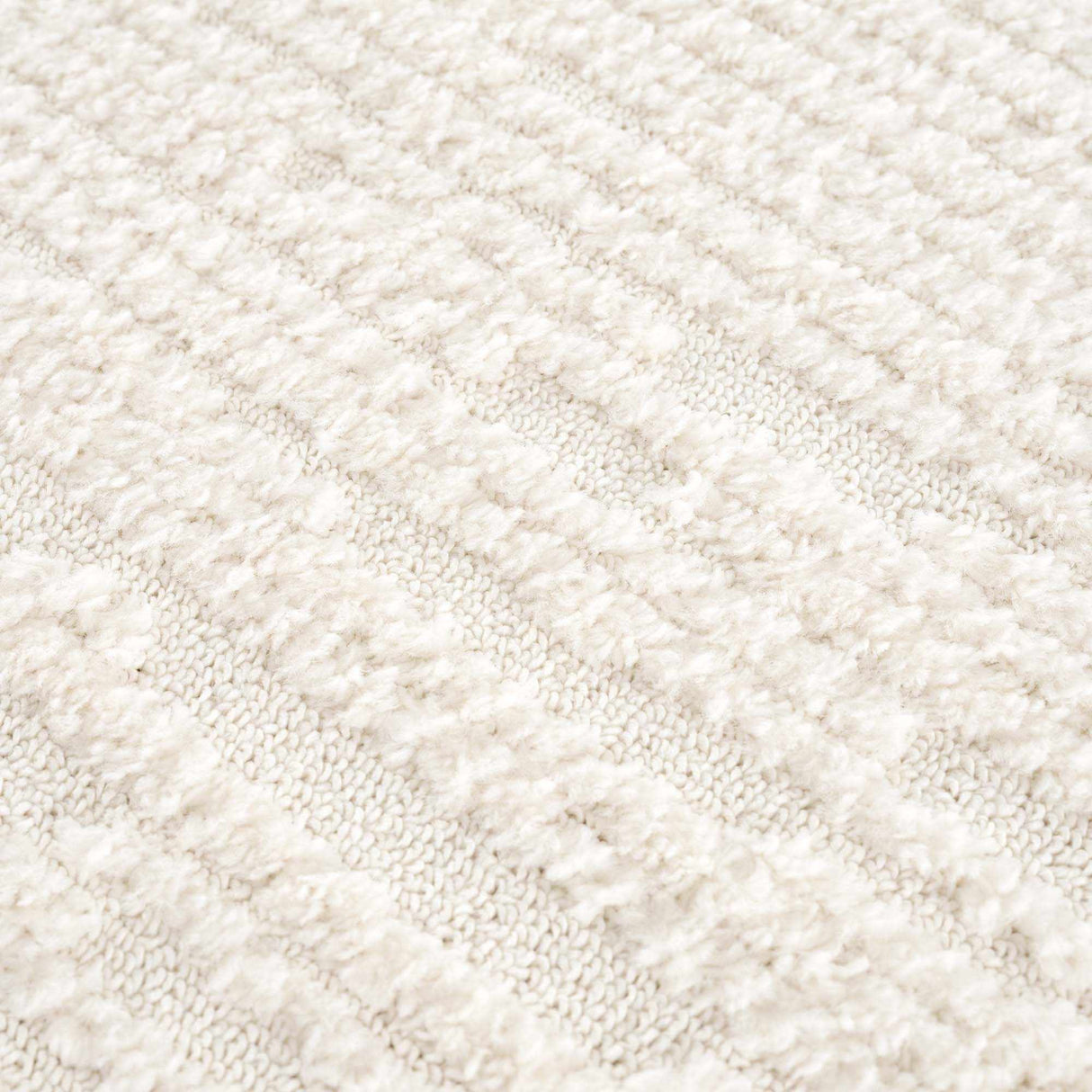 Kulu Textured Area Rug with Tassels