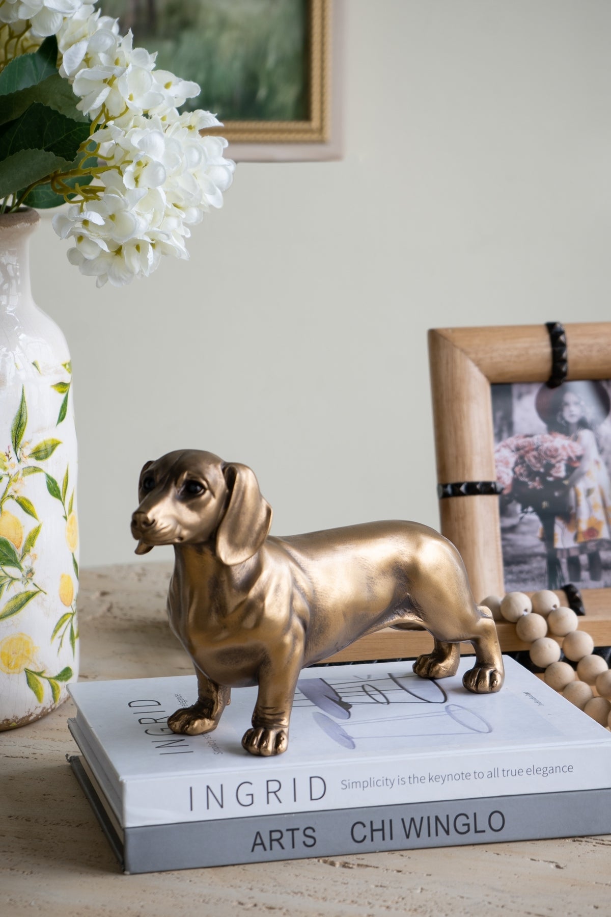 EVERGREEN DECOR Lifelike Dachshund Figurine with Copper Finish
