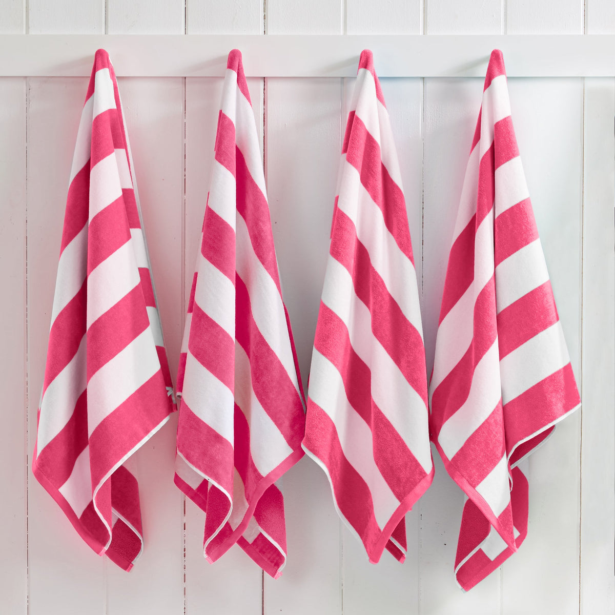 Great Bay Home Cotton Velour Cabana Stripe Beach Towel in Bright Pink