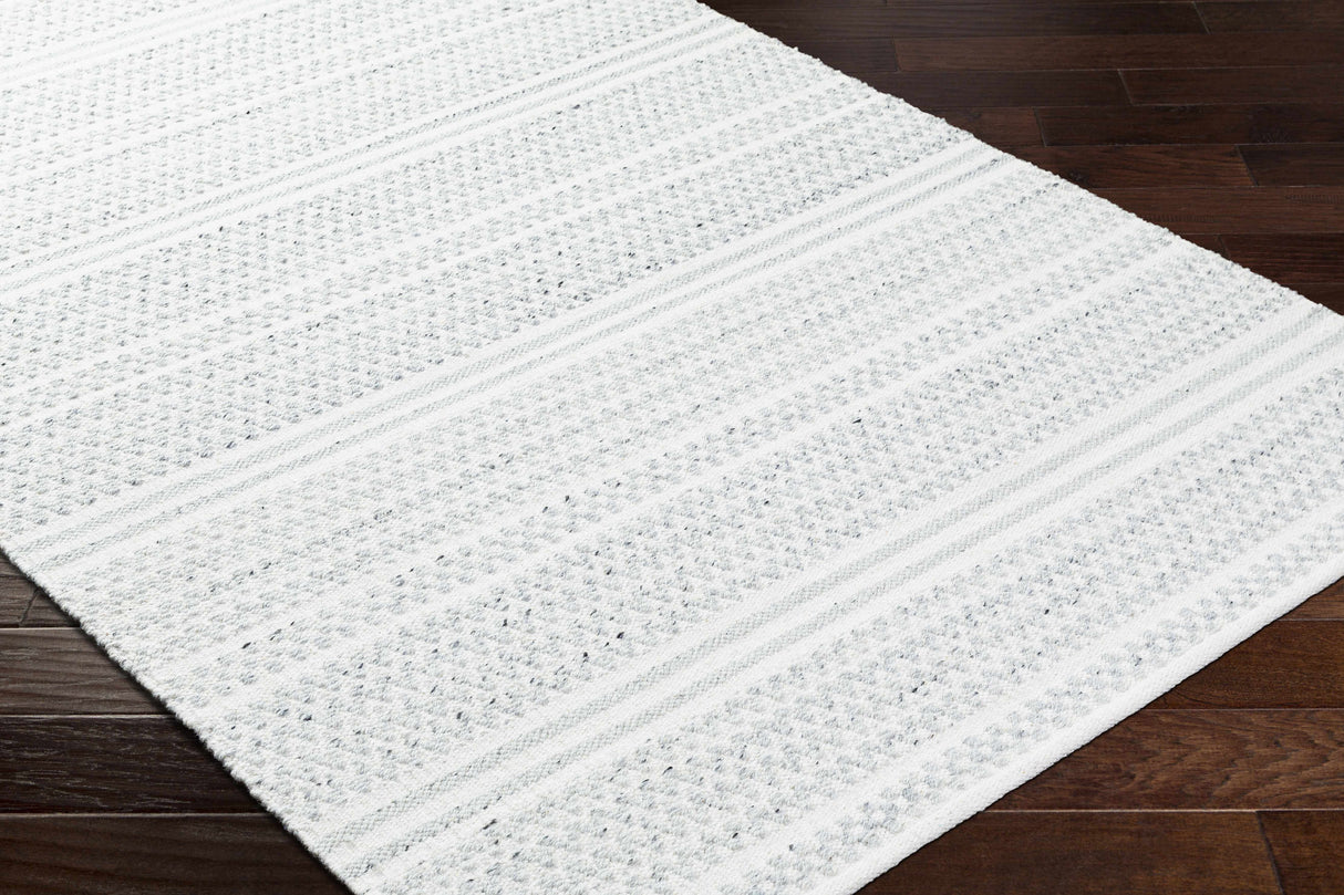 Kendi Cream Area Rug - Clearance