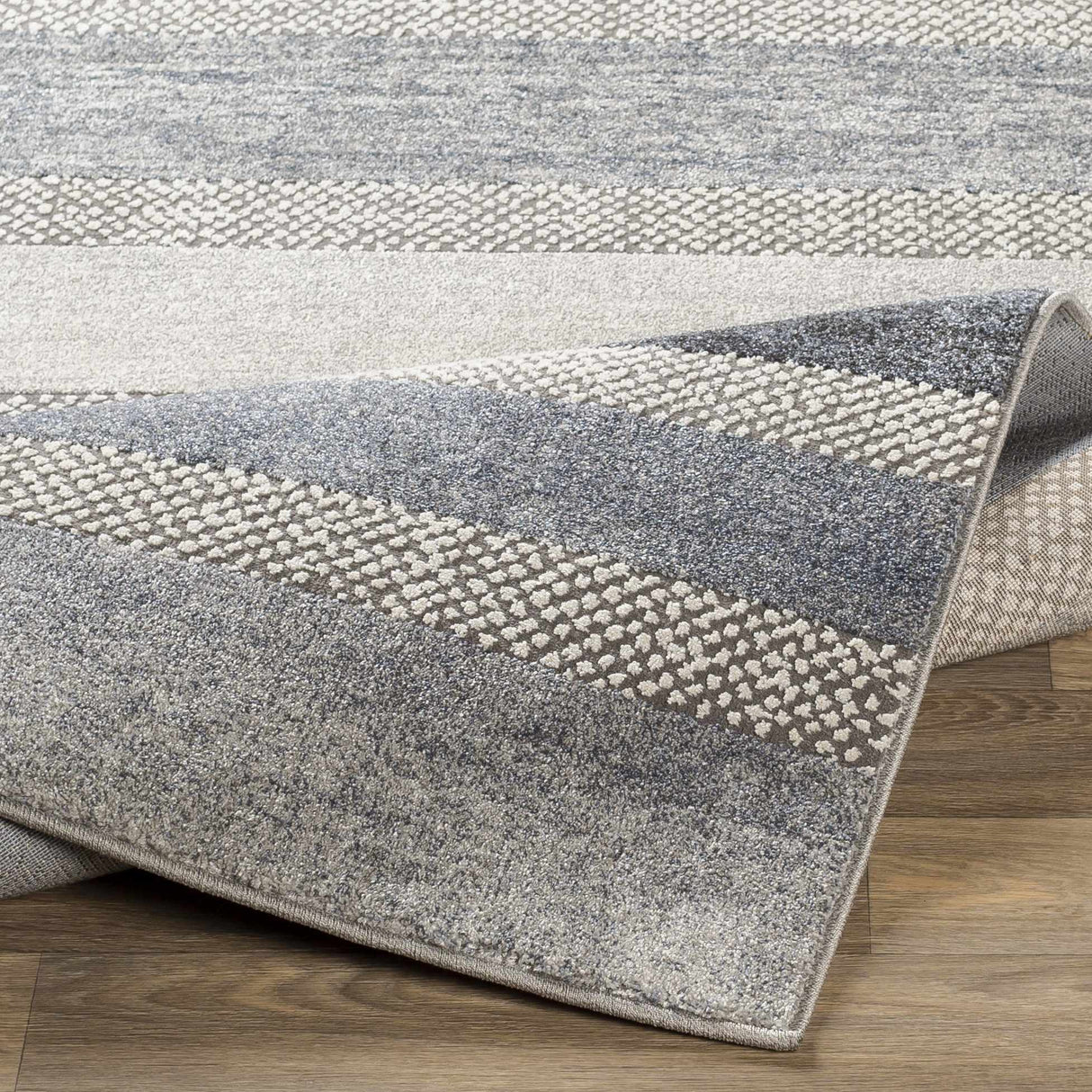 Ravendale Area Rug - Clearance