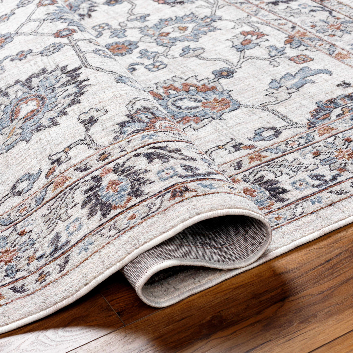 Ardin Cream Area Rug - Clearance