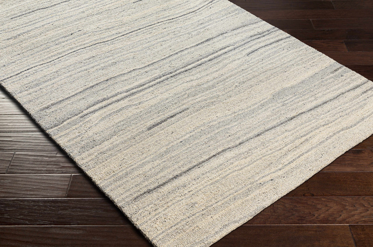 Tinubuan Area Rug - Clearance