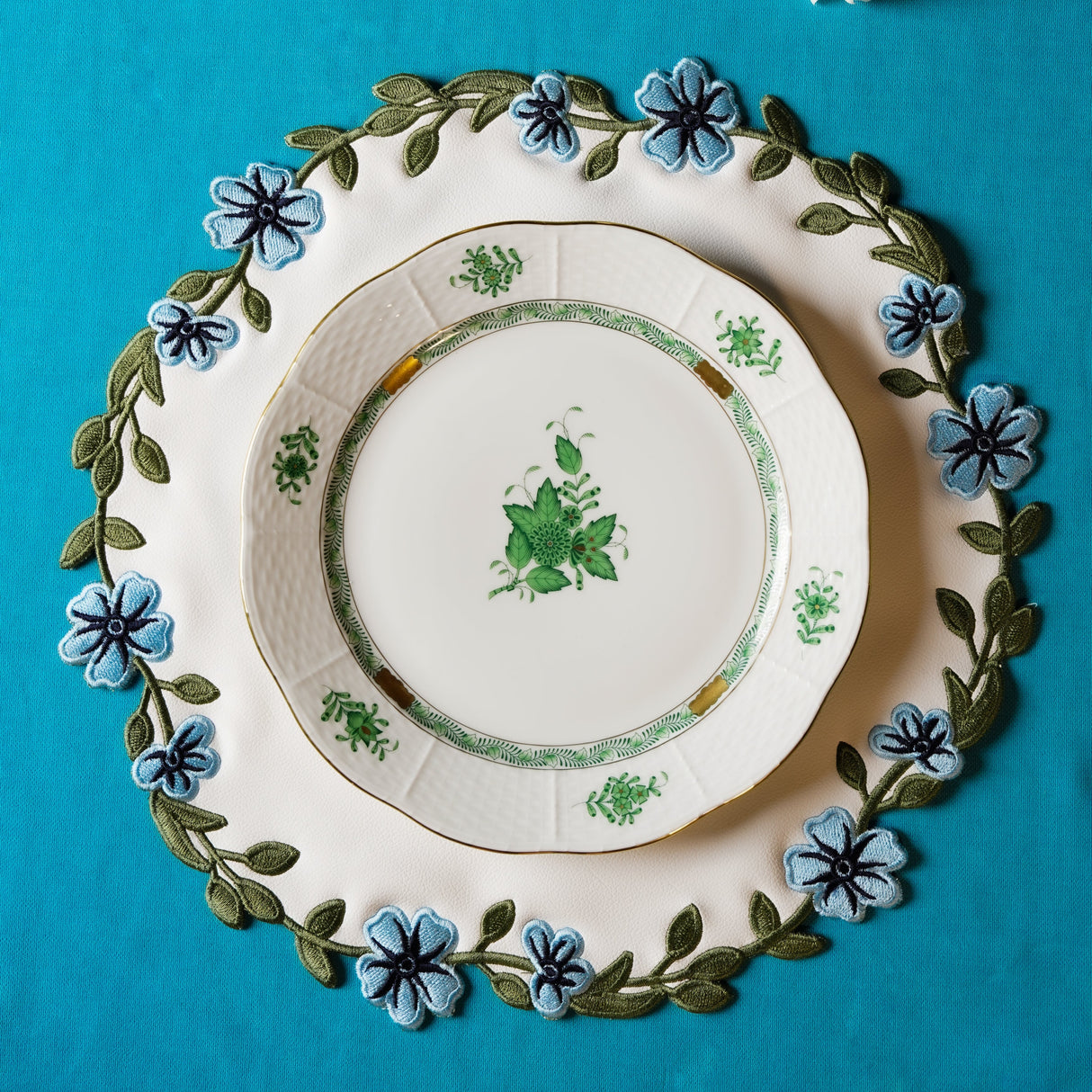 Unity White Blue Round Faux Leather Placemat