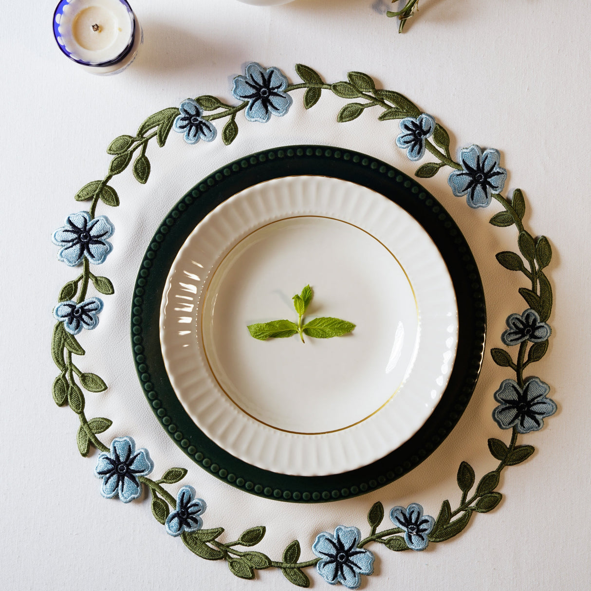 Unity White Blue Round Faux Leather Placemat