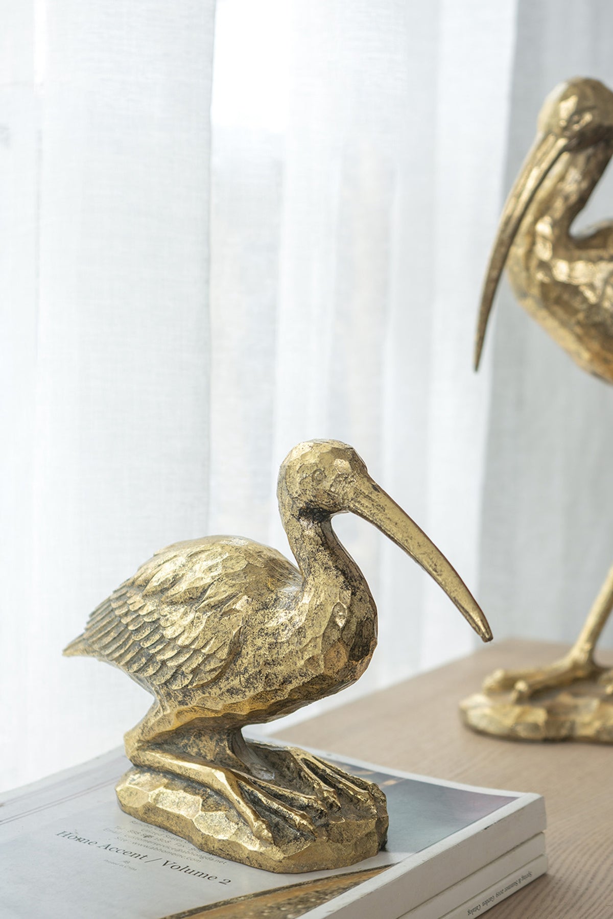 Kneeling Crane Figurine, 7.1 x 10.4 x 3 Inches, Antique Gold