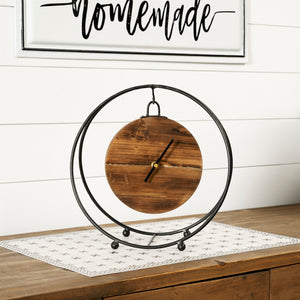 Natural wooden hanging clock in round metal stand 11.5"d