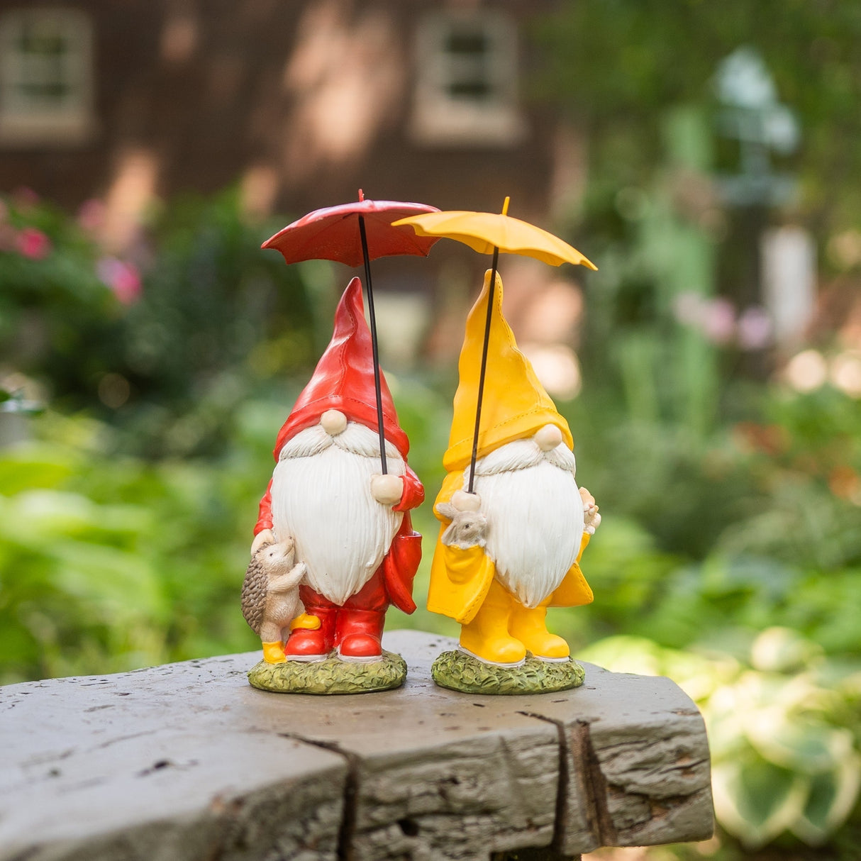Garden gnome with umbrella and woodland animals (set of 4)