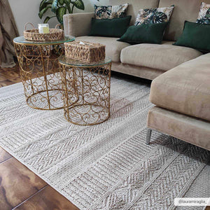 Corom Beige Area Rug - Clearance
