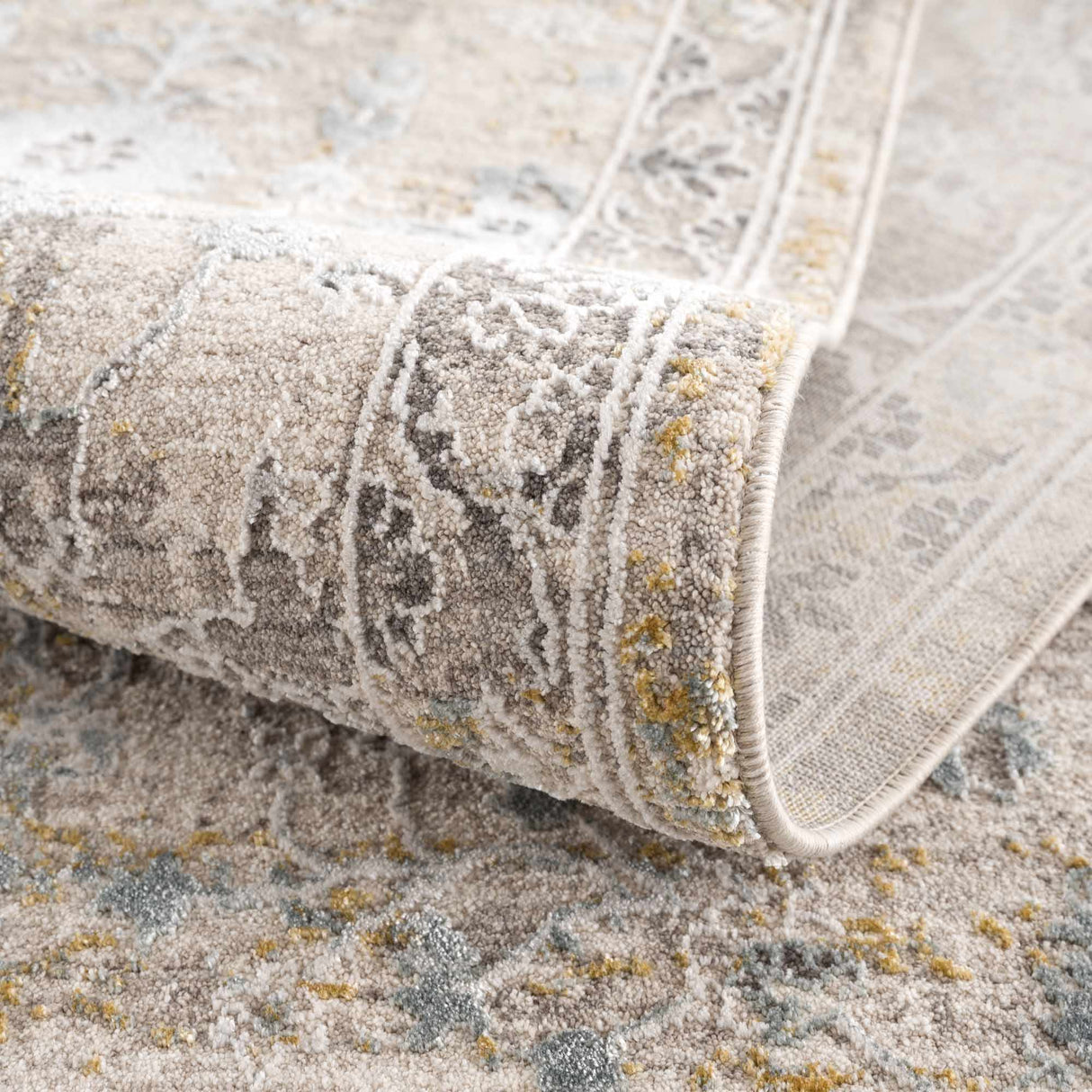 Alroy Textured Rug with Fringes