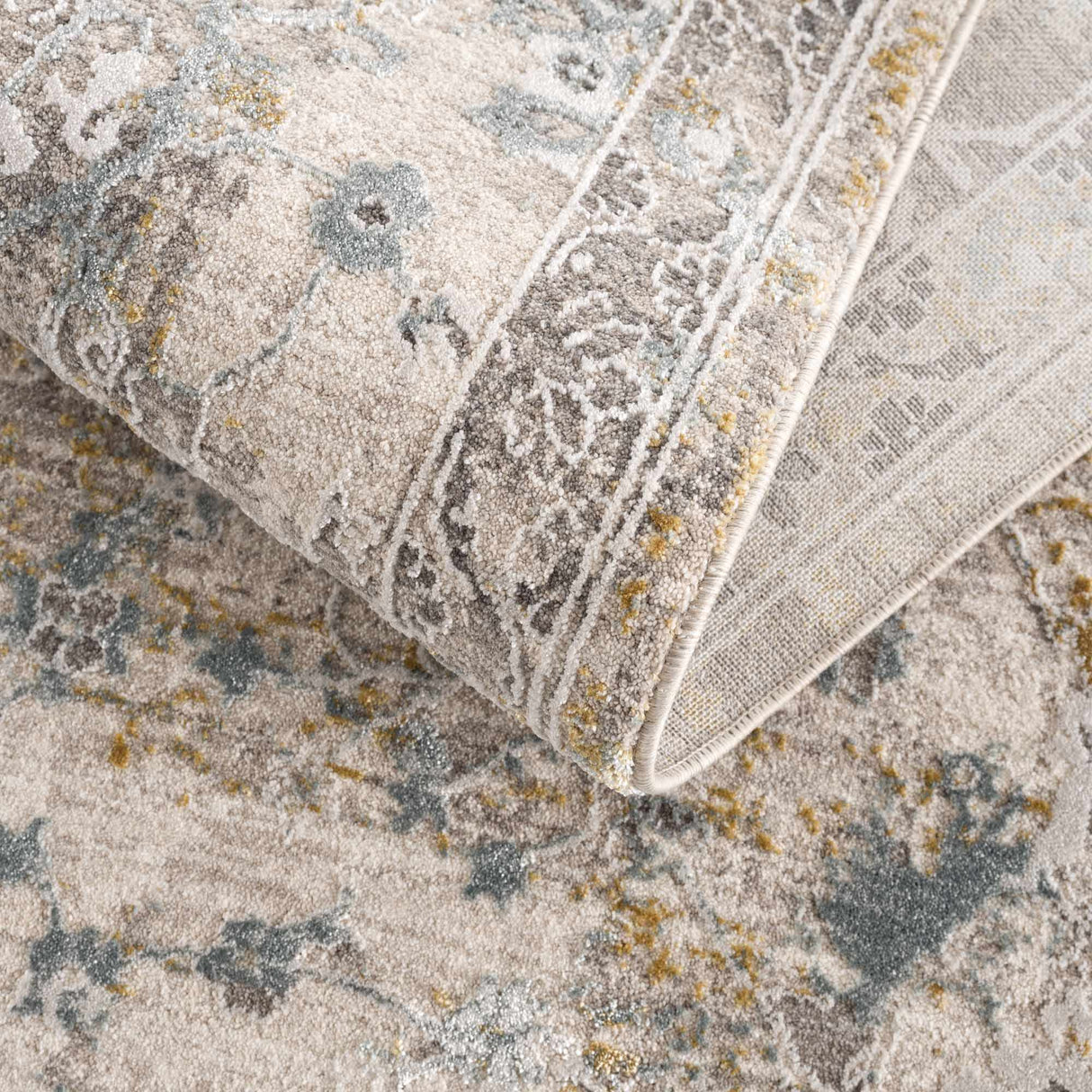 Alroy Textured Rug with Fringes