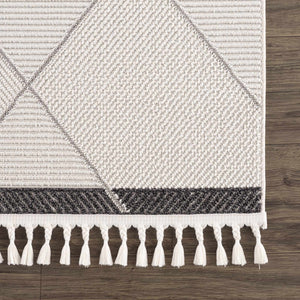 Tale Area Rug