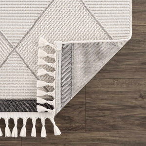 Tale Area Rug