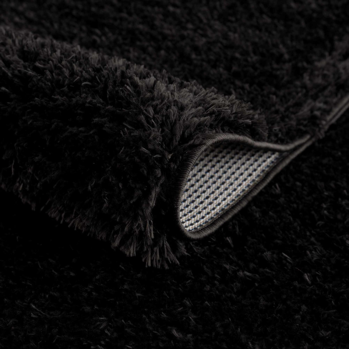 Faina Solid Black Shag Washable Area Rug - Clearance