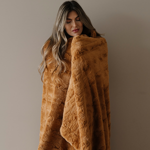 Faux Fur Throw Blankets by Saranoni