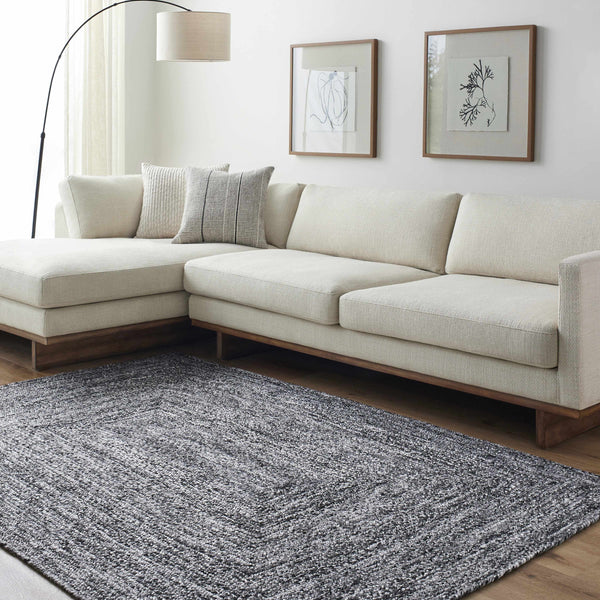 Kenyi Black Area Rug - Clearance