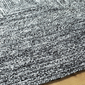 Kenyi Black Area Rug - Clearance