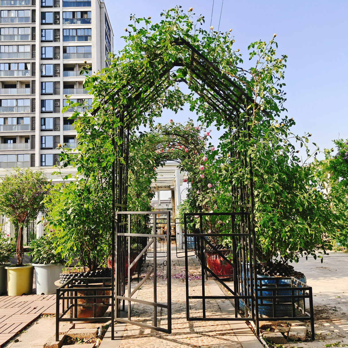 Metal Garden Arch with Gate and Planter for Climbing Plants