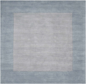 Arkabutla Solid Blue Bordered Wool Rug
