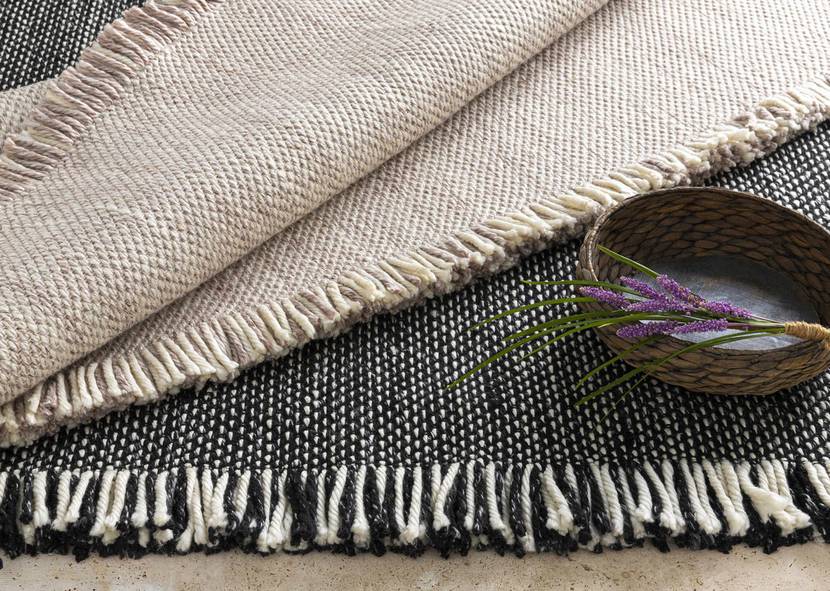 Boyden Black Area Rug with Tassels - Clearance