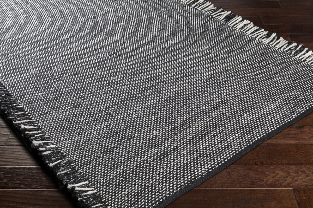 Boyden Black Area Rug with Tassels - Clearance