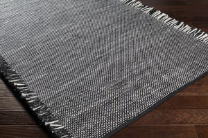 Boyden Black Area Rug with Tassels - Clearance