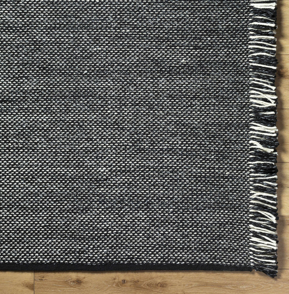 Boyden Black Area Rug with Tassels - Clearance