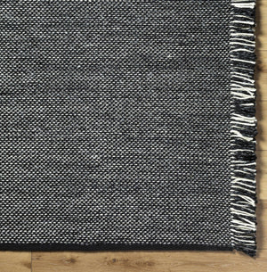 Boyden Black Area Rug with Tassels - Clearance