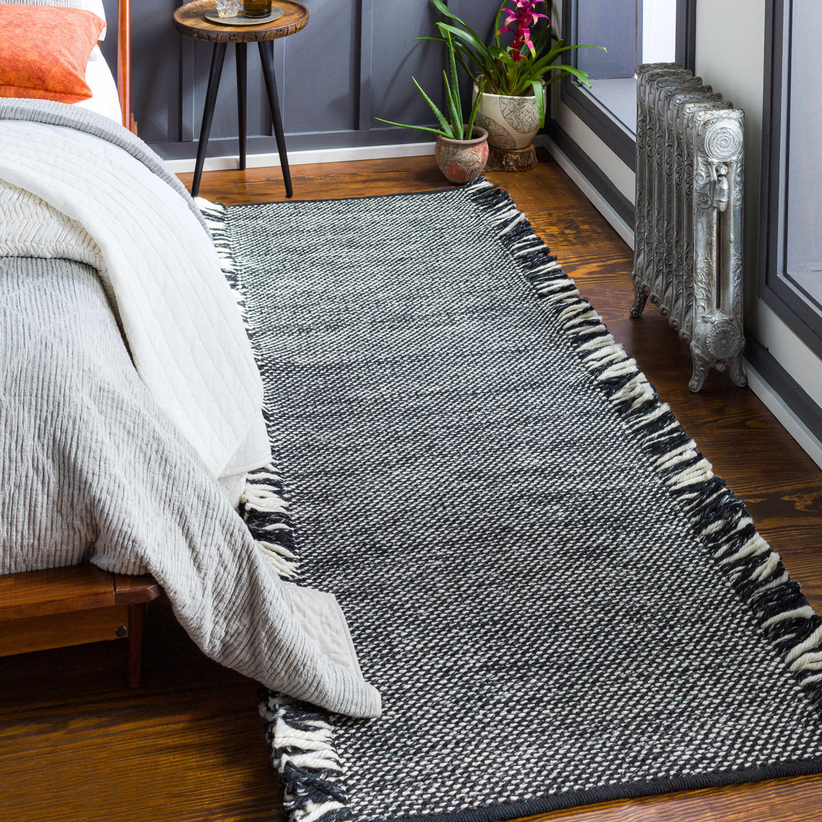 Boyden Black Area Rug with Tassels - Clearance