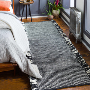 Boyden Black Area Rug with Tassels - Clearance