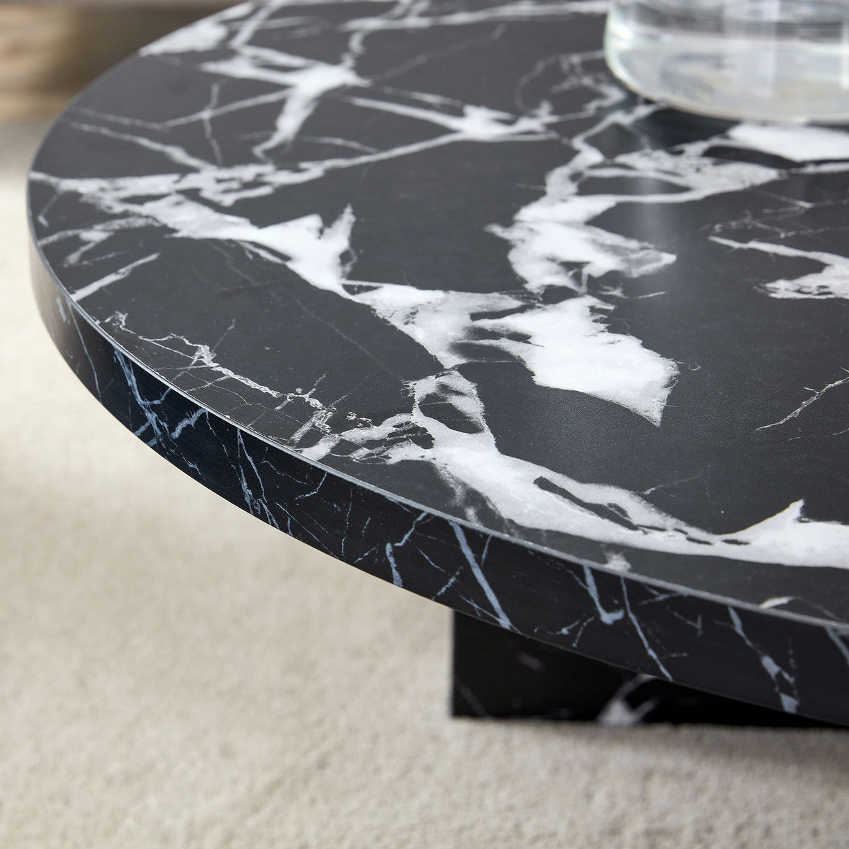 Versatile Round Coffee Table For Various Interior Styles