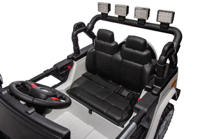 12V7A 30W*2 Four-Wheel Drive Seat One Button Start, Forward And Backward, High And Low Speed, Music, Front Light, Power Display, Two Doors Can Open, 2.4G R / C, Seat Belt Four Wheel Absorber