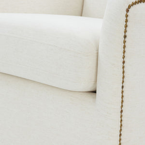Tolland - Swivel Accent Chair With Antique Brass Nailhead Trim - Cream