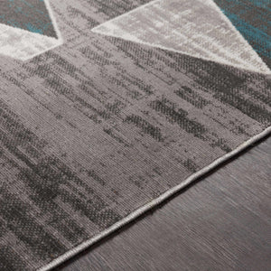 Hessel Green Triangles Area Rug