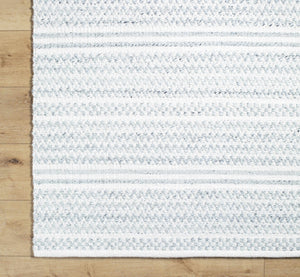 Kendi Cream Area Rug - Clearance
