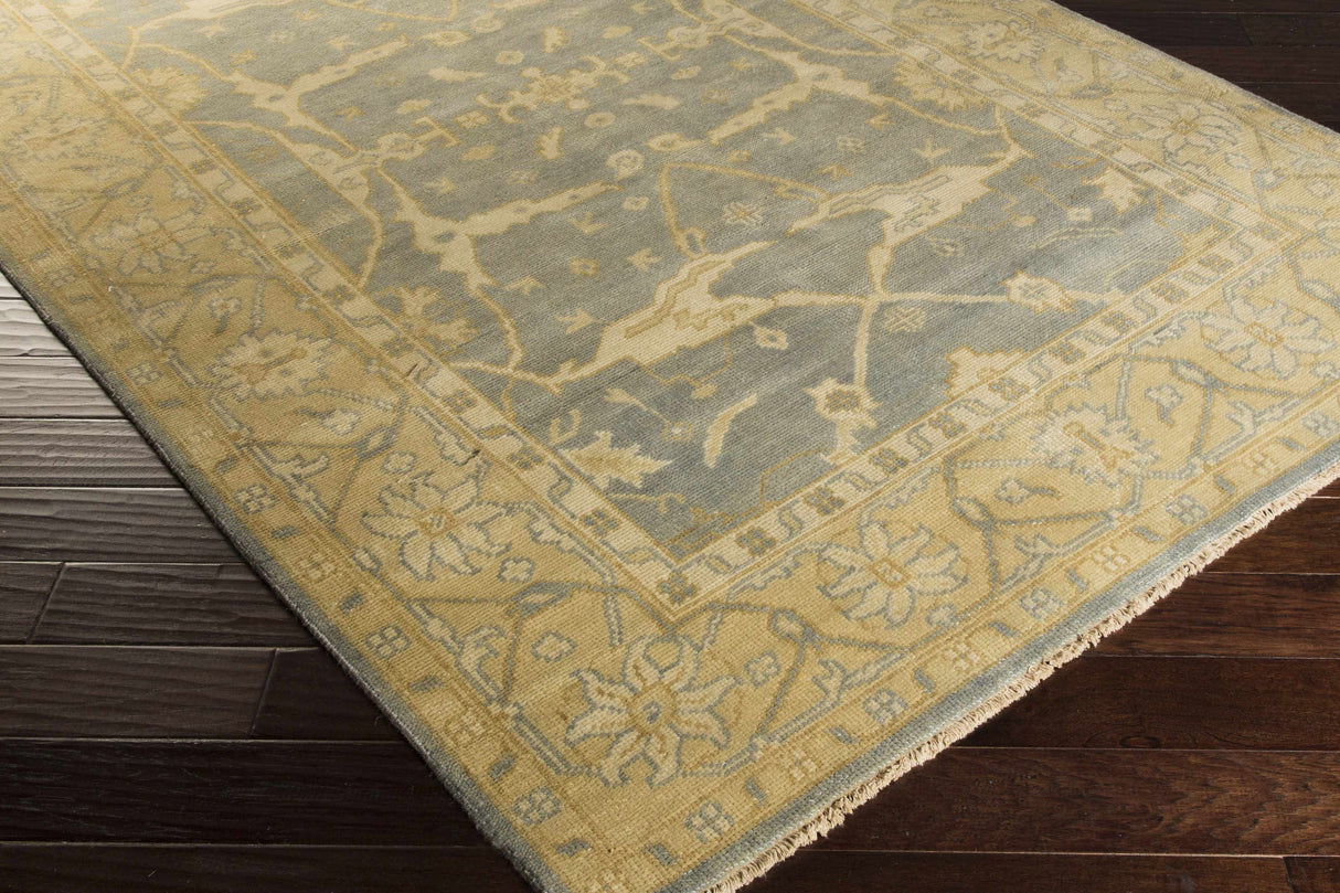 Kouts Area Rug - Clearance