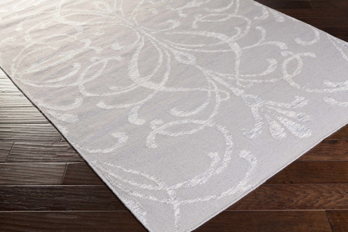 Lejunior Area Rug - Clearance