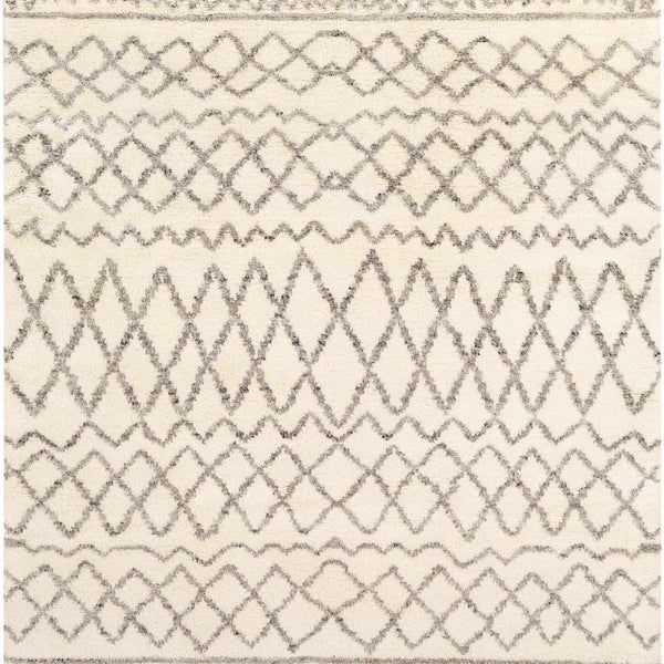 Manquin Area Rug - Clearance