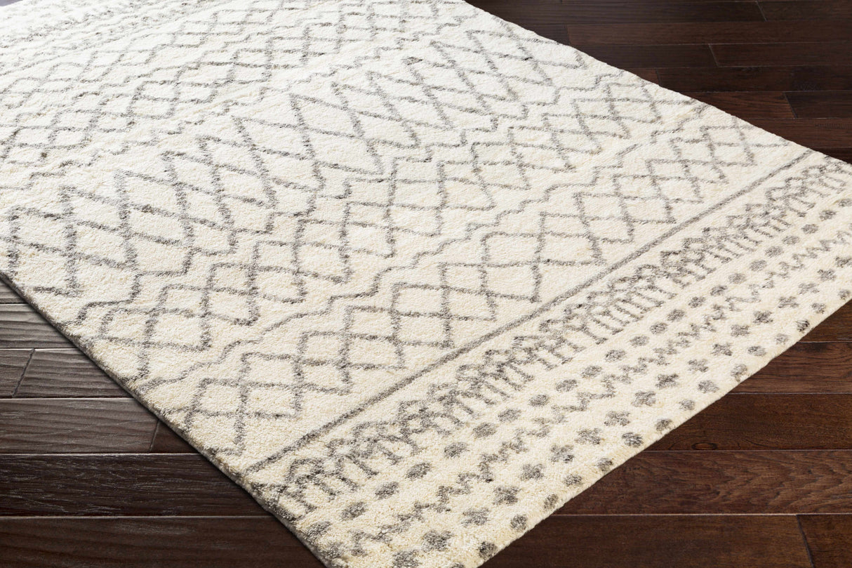 Manquin Area Rug - Clearance