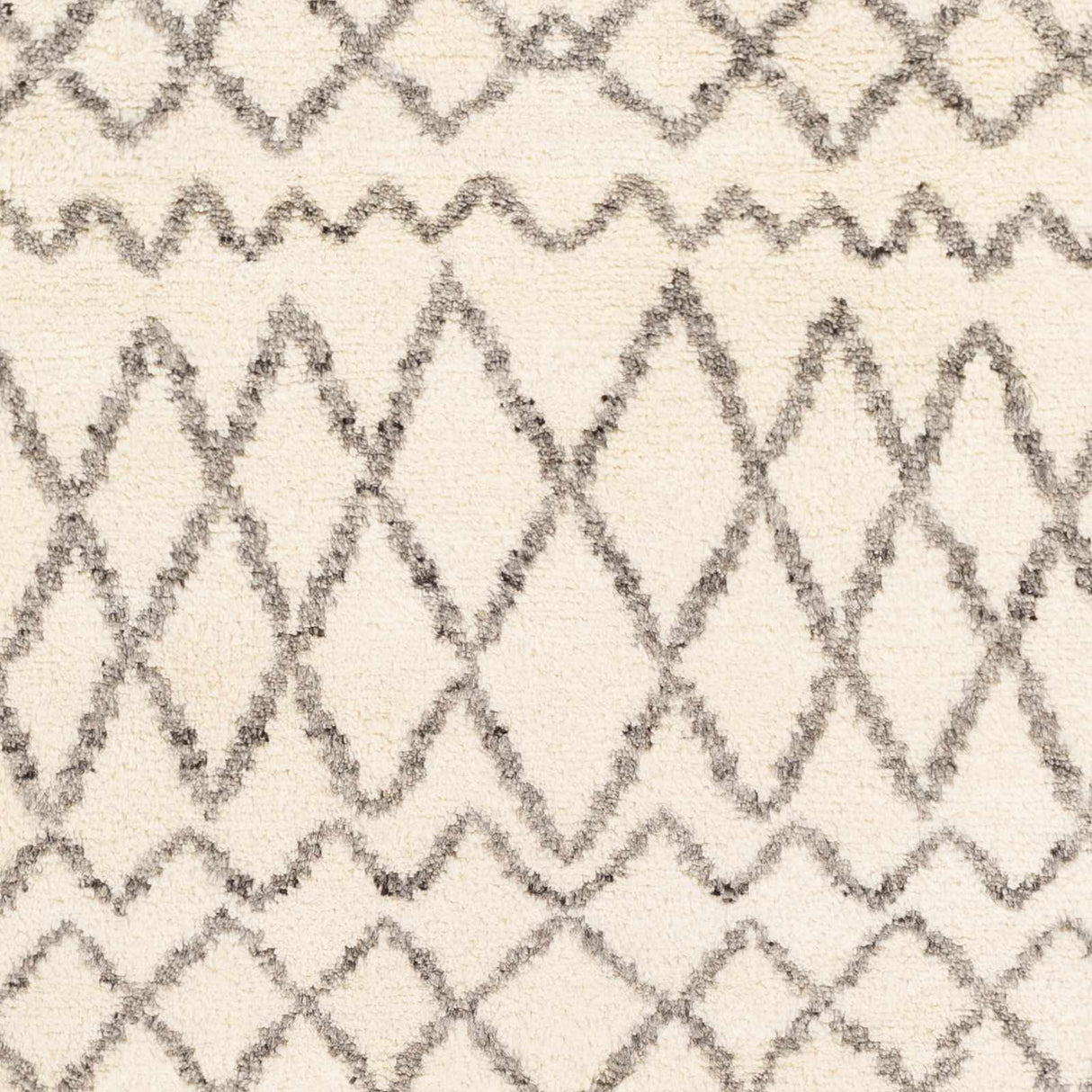 Manquin Area Rug - Clearance