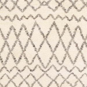 Manquin Area Rug - Clearance