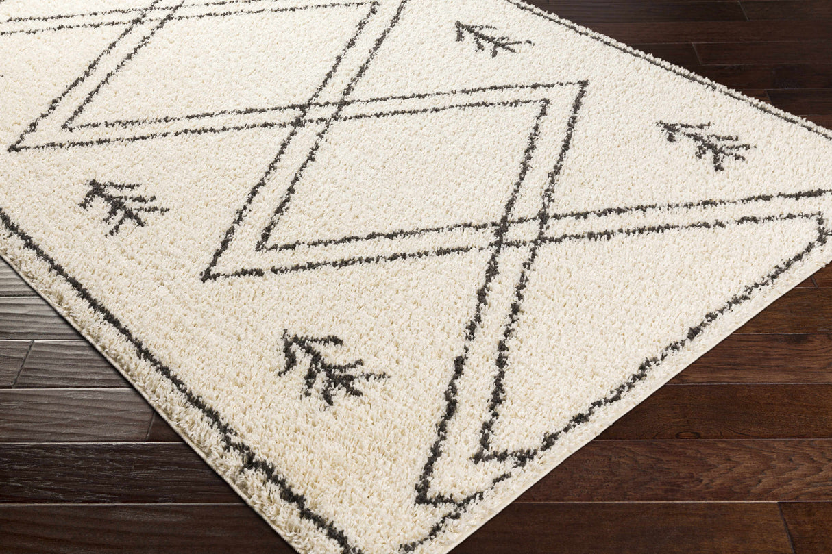 Nancalobasaan Area Rug - Clearance