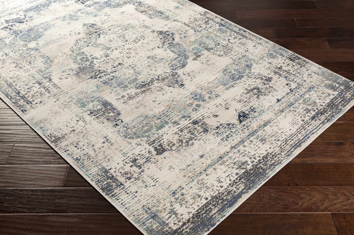 Needingworth Area Rug - Clearance