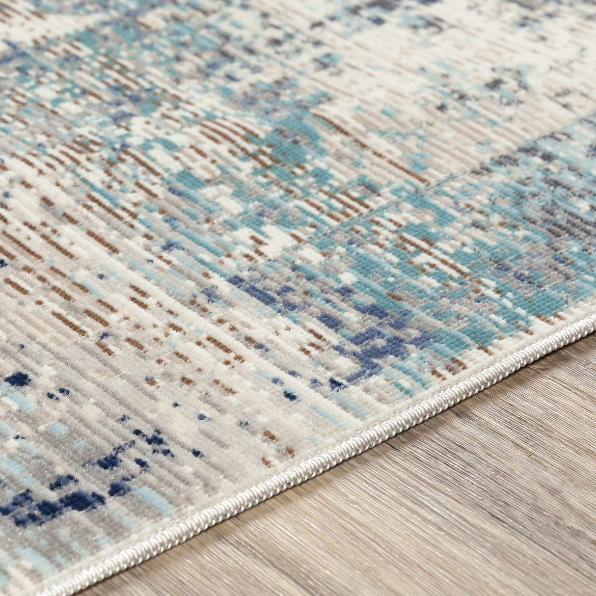 Needingworth Area Rug - Clearance
