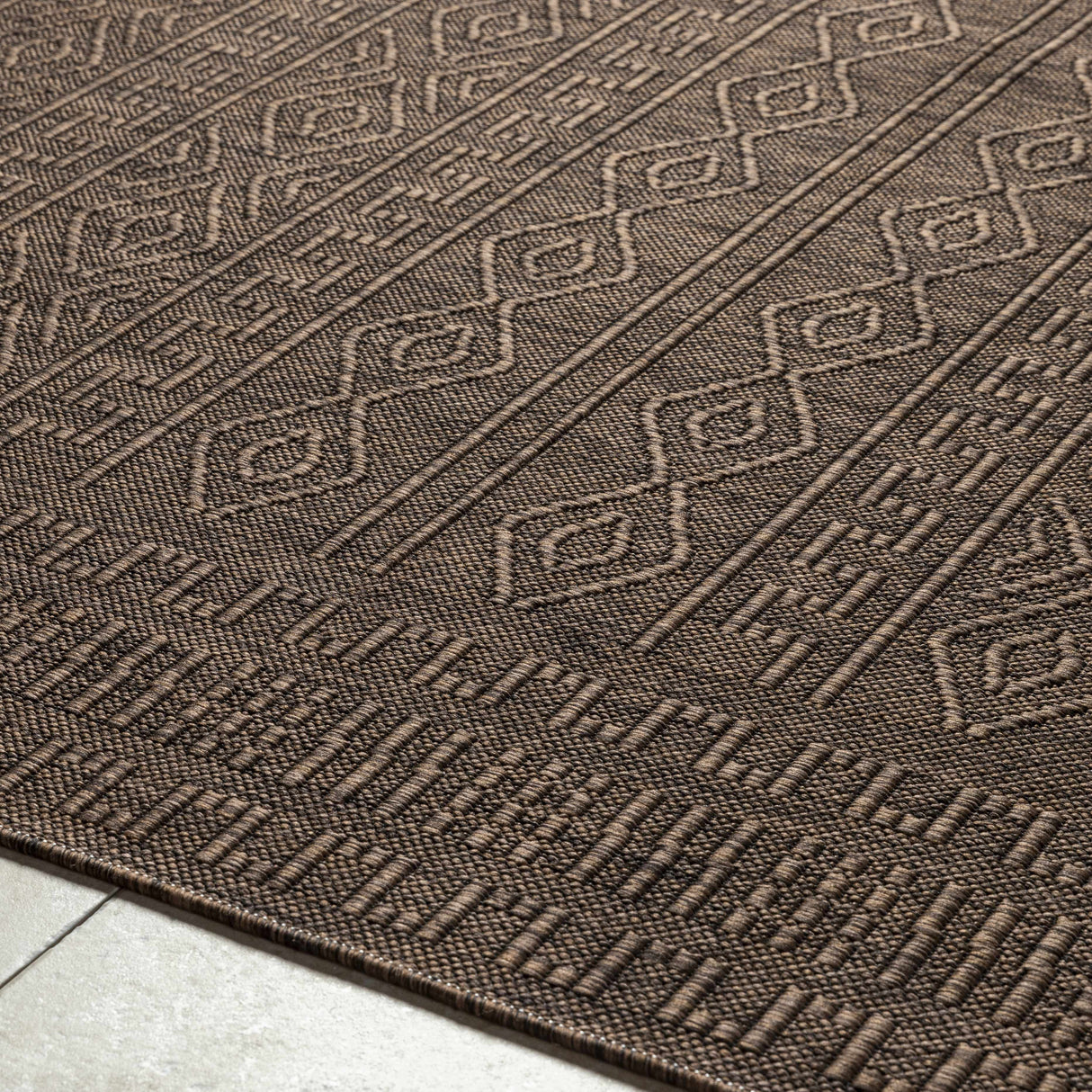 Nuela Dark Brown Area Rug - Clearance