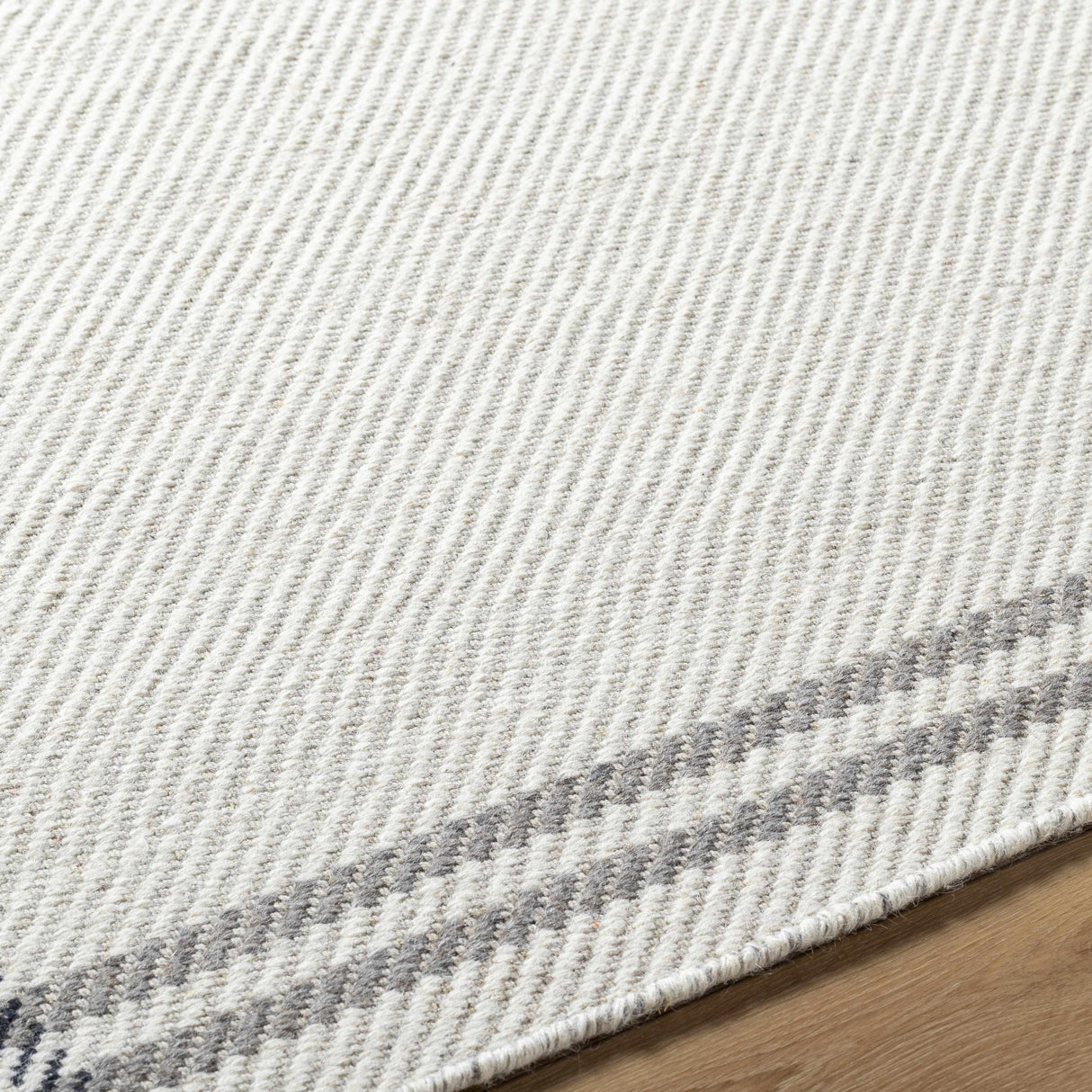 Nimue Cream & Charcoal Bordered Area Rug - Clearance