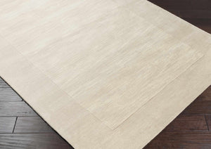 Bordered Solid Beige Cream Wool Rug